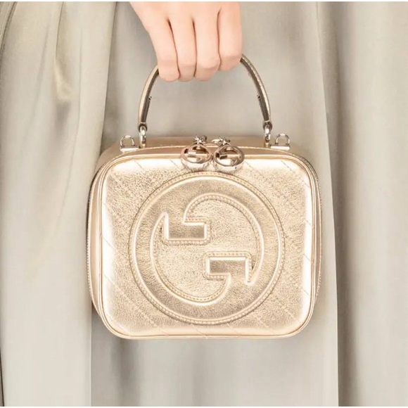 Gucci Handbags - Gucci Blondie Gold Leather Top Handle Bag Rare Metallic Nappa